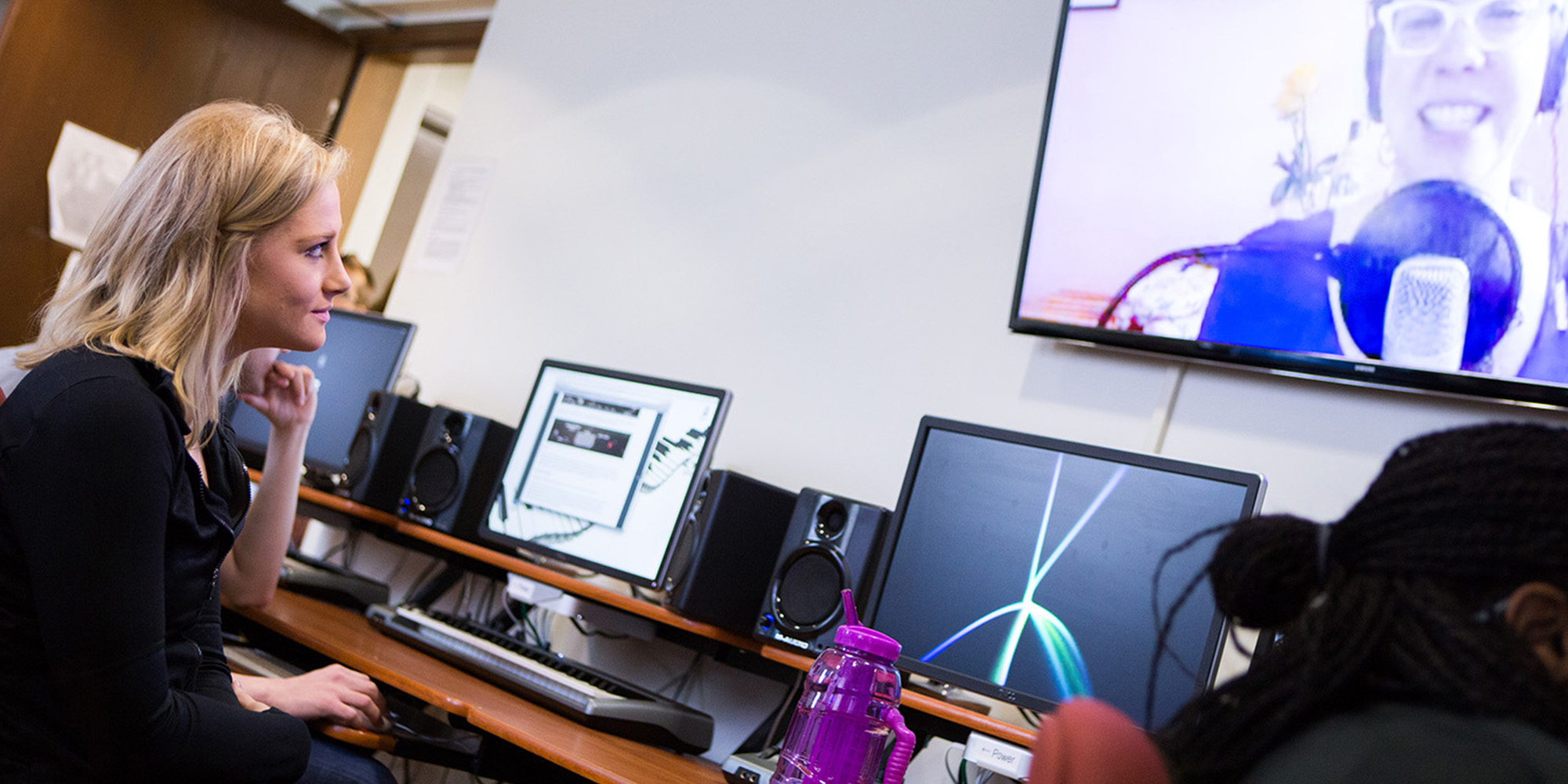 Female Student In Front Of A Screen